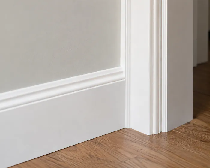 Painted interior door casing and baseboard